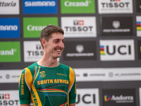 Alan Hatherly of South Africa stands on the podium at the UCI Mountain Bike World Championships Men Under 23 Race in Pal Arinsal, Andorra, o...