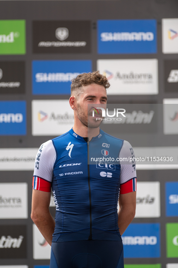 Victor Koretzky of France stands on the podium at the UCI Mountain Bike World Championships Men Under 23 Race in Pal Arinsal, Andorra, on Se...