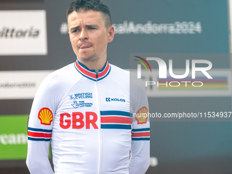 Thomas Pidcock of Great Britain stands on the podium at the UCI Mountain Bike World Championships Men Under 23 Race in Pal Arinsal, Andorra,...