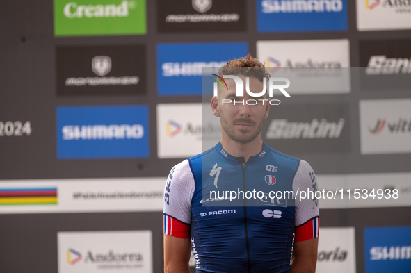 Victor Koretzky of France stands on the podium at the UCI Mountain Bike World Championships Men Under 23 Race in Pal Arinsal, Andorra, on Se...