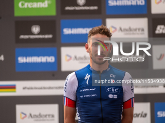 Victor Koretzky of France stands on the podium at the UCI Mountain Bike World Championships Men Under 23 Race in Pal Arinsal, Andorra, on Se...