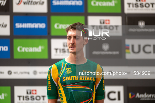 Alan Hatherly of South Africa stands on the podium at the UCI Mountain Bike World Championships Men Under 23 Race in Pal Arinsal, Andorra, o...