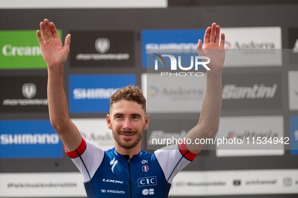 Victor Koretzky of France stands on the podium at the UCI Mountain Bike World Championships Men Under 23 Race in Pal Arinsal, Andorra, on Se...