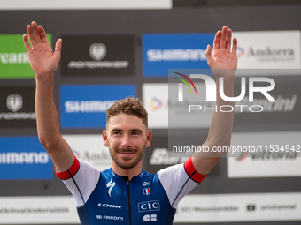 Victor Koretzky of France stands on the podium at the UCI Mountain Bike World Championships Men Under 23 Race in Pal Arinsal, Andorra, on Se...