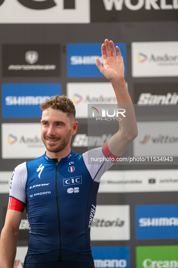 Victor Koretzky of France stands on the podium at the UCI Mountain Bike World Championships Men Under 23 Race in Pal Arinsal, Andorra, on Se...