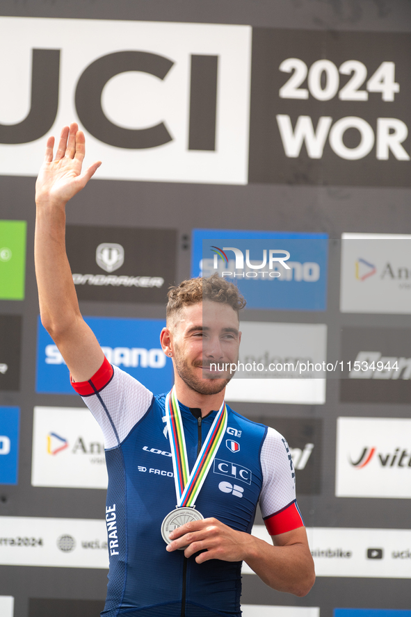 Victor Koretzky of France stands on the podium at the UCI Mountain Bike World Championships Men Under 23 Race in Pal Arinsal, Andorra, on Se...