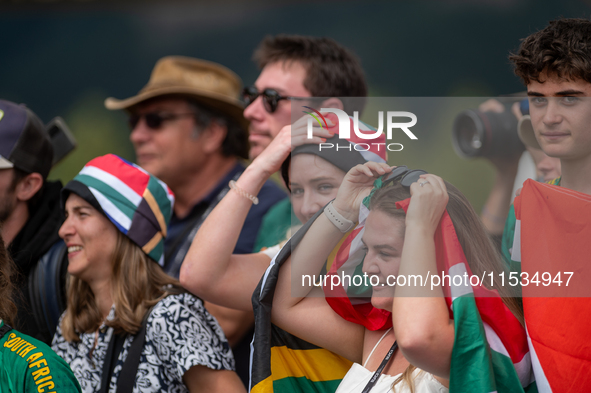 South African fans attend the UCI Mountain Bike World Championships Men Under 23 Race in Pal Arinsal, Andorra, on September 1, 2024. 