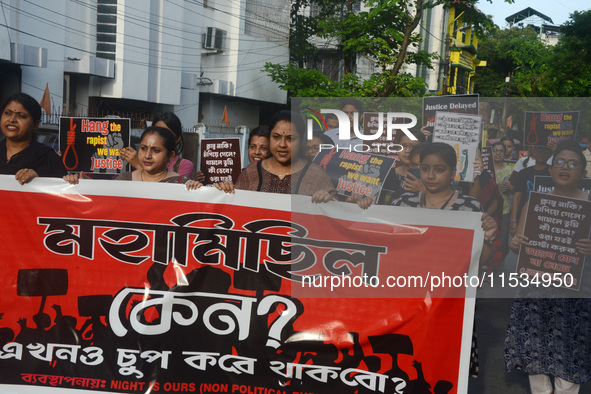 Activists of the women's organization named 'Night is Ours' protest during a nationwide strike by doctors to condemn the rape and murder of...