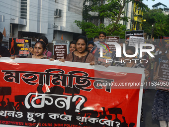 Activists of the women's organization named 'Night is Ours' protest during a nationwide strike by doctors to condemn the rape and murder of...