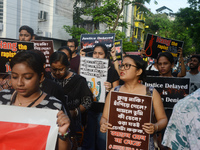 Activists of the women's organization named 'Night is Ours' protest during a nationwide strike by doctors to condemn the rape and murder of...