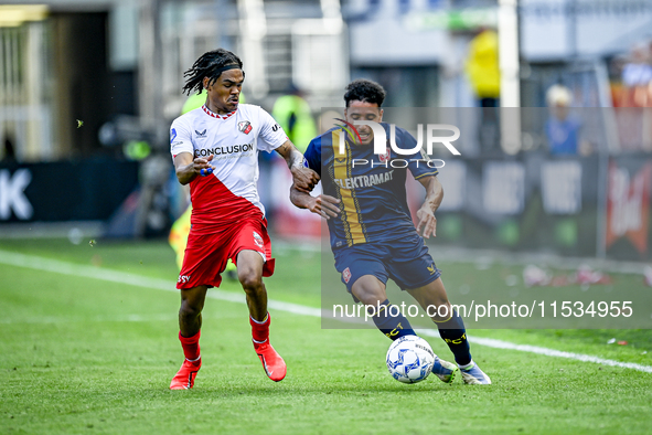 FC Utrecht player Alonzo Engwanda and FC Twente player Sayf Ltaief during the match between Utrecht and Twente at Stadium Galgenwaard for th...