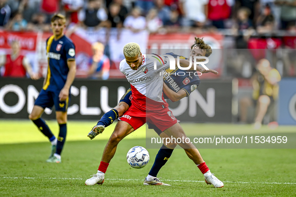 FC Utrecht player Can Bozdogan and FC Twente player Youri Regeer during the match Utrecht vs. Twente at Stadium Galgenwaard for the Dutch Er...