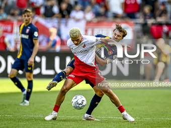 FC Utrecht player Can Bozdogan and FC Twente player Youri Regeer during the match Utrecht vs. Twente at Stadium Galgenwaard for the Dutch Er...