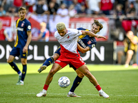 FC Utrecht player Can Bozdogan and FC Twente player Youri Regeer during the match Utrecht vs. Twente at Stadium Galgenwaard for the Dutch Er...