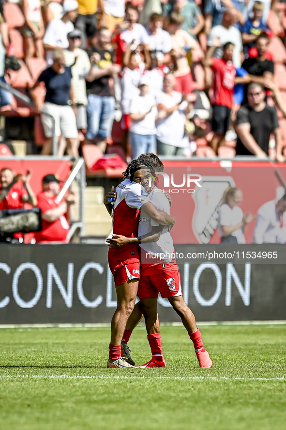 FC Utrecht player Souffian El Karouani and FC Twente player celebrate the win during the match Utrecht vs. Twente at Stadium Galgenwaard for...