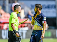 Referee Dennis Higler and FC Twente player Ricky van Wolfswinkel during the match between Utrecht and Twente at Stadium Galgenwaard for the...