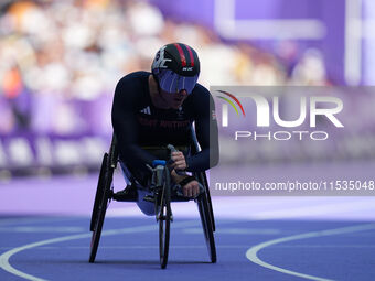 Nathan Maguire of Great Britain in action in Men's 400m - T54 Round 1 during the Paris 2024 Paralympic Games at Stade de France on September...