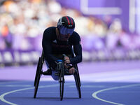 Nathan Maguire of Great Britain in action in Men's 400m - T54 Round 1 during the Paris 2024 Paralympic Games at Stade de France on September...