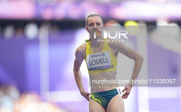 Mali Lovell of Australia celebrates winning bronze in Women's 200m - T36 Final during the Paris 2024 Paralympic Games at Stade de France on...