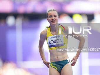 Mali Lovell of Australia celebrates winning bronze in Women's 200m - T36 Final during the Paris 2024 Paralympic Games at Stade de France on...