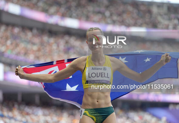 Mali Lovell of Australia celebrates winning bronze in Women's 200m - T36 Final during the Paris 2024 Paralympic Games at Stade de France on...