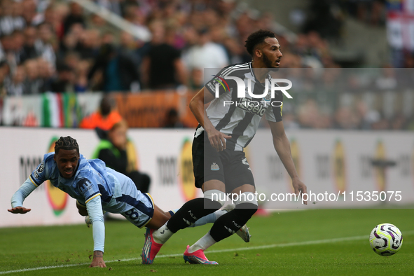 Newcastle United's Lloyd Kelly turns against Tottenham Hotspur's Wilson Odobert during the Premier League match between Newcastle United and...