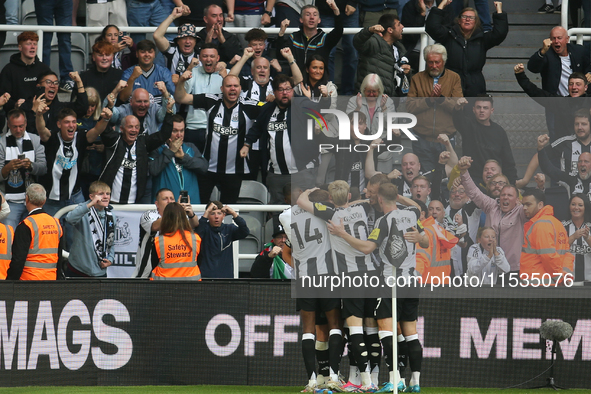 Newcastle United's fans celebrate Harvey Barnes' goal during the Premier League match between Newcastle United and Tottenham Hotspur at St....