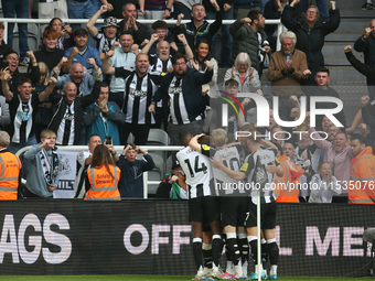 Newcastle United's fans celebrate Harvey Barnes' goal during the Premier League match between Newcastle United and Tottenham Hotspur at St....