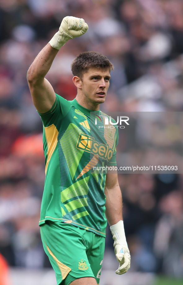 Newcastle United goalkeeper Nick Pope celebrates Harvey Barnes' goal during the Premier League match between Newcastle United and Tottenham...