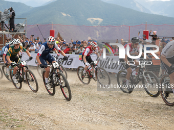 Cyclists participate in the UCI Mountain Bike World Championships Men in Pal Arinsal, Andorra, on September 1, 2024. (