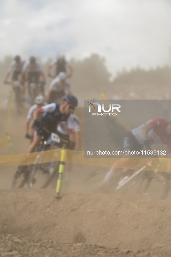 Cyclists participate in the UCI Mountain Bike World Championships Men in Pal Arinsal, Andorra, on September 1, 2024. 