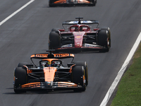 Oscar Piastri of McLaren, Charles Leclerc of Ferrari, Lando Norris of McLaren and Carlos Sainz of Ferrari during the Formula 1 Italian Grand...