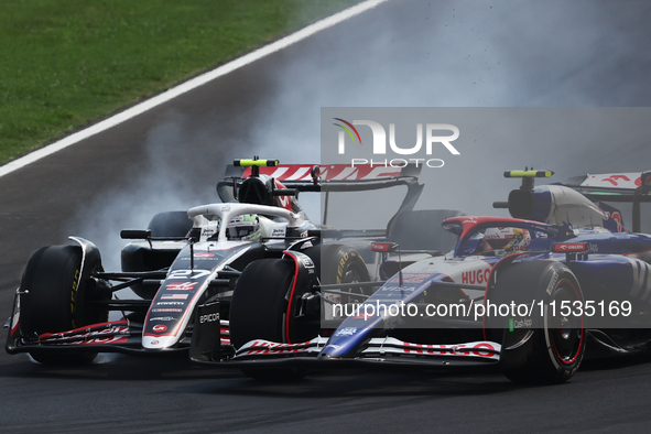 Nico Hulkenberg of Haas and Yuki Tsunoda of RB during the Formula 1 Italian Grand Prix at Autodromo Nazionale di Monza in Monza, Italy on Se...