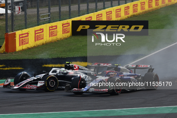 Nico Hulkenberg of Haas and Yuki Tsunoda of RB during the Formula 1 Italian Grand Prix at Autodromo Nazionale di Monza in Monza, Italy on Se...