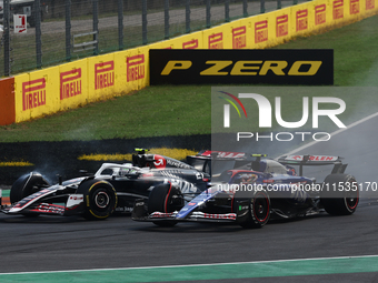 Nico Hulkenberg of Haas and Yuki Tsunoda of RB during the Formula 1 Italian Grand Prix at Autodromo Nazionale di Monza in Monza, Italy on Se...