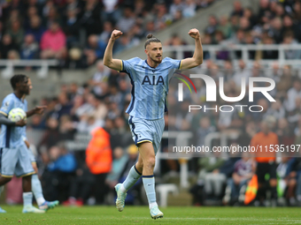 Radu Dragusin of Tottenham Hotspur celebrates Tottenham Hotspur's equalizer during the Premier League match between Newcastle United and Tot...