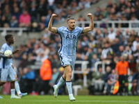 Radu Dragusin of Tottenham Hotspur celebrates Tottenham Hotspur's equalizer during the Premier League match between Newcastle United and Tot...