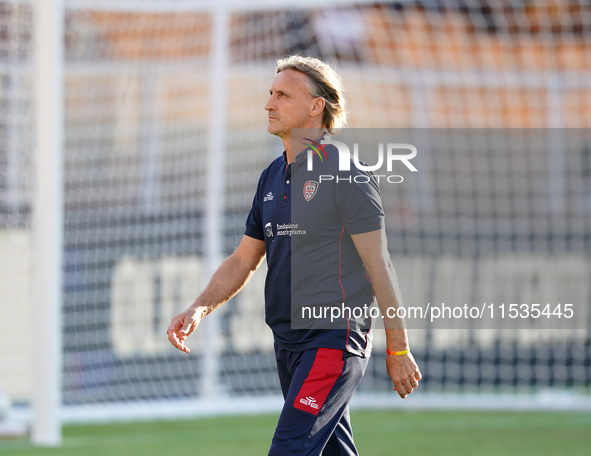 Davide Nicola, head coach of Cagliari Calcio, watches the Serie A match between Lecce and Cagliari in Lecce, Italy, on August 31, 2024. 