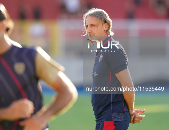 Davide Nicola, head coach of Cagliari Calcio, watches the Serie A match between Lecce and Cagliari in Lecce, Italy, on August 31, 2024. 