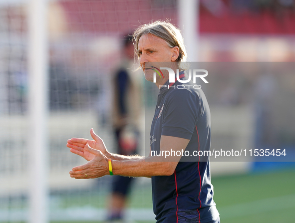 Davide Nicola, head coach of Cagliari Calcio, watches the Serie A match between Lecce and Cagliari in Lecce, Italy, on August 31, 2024. 