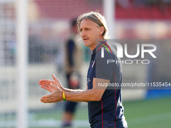 Davide Nicola, head coach of Cagliari Calcio, watches the Serie A match between Lecce and Cagliari in Lecce, Italy, on August 31, 2024. (