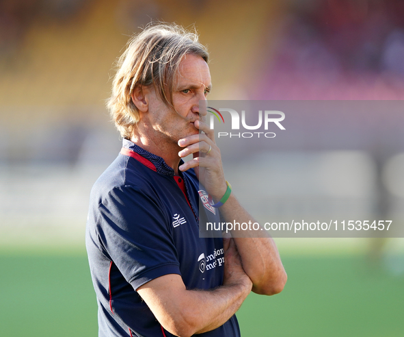 Davide Nicola, head coach of Cagliari Calcio, watches the Serie A match between Lecce and Cagliari in Lecce, Italy, on August 31, 2024. 