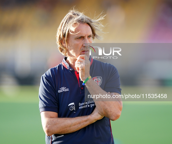 Davide Nicola, head coach of Cagliari Calcio, watches the Serie A match between Lecce and Cagliari in Lecce, Italy, on August 31, 2024. 