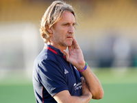 Davide Nicola, head coach of Cagliari Calcio, watches the Serie A match between Lecce and Cagliari in Lecce, Italy, on August 31, 2024. (