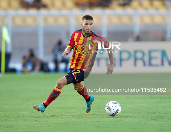 Frederic Gilbert of US Lecce is in action during the Serie A match between Lecce and Cagliari in Lecce, Italy, on August 31, 2024. 