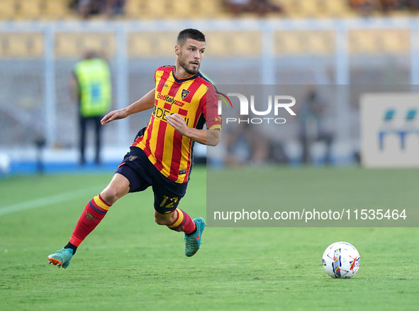 Frederic Gilbert of US Lecce is in action during the Serie A match between Lecce and Cagliari in Lecce, Italy, on August 31, 2024. 