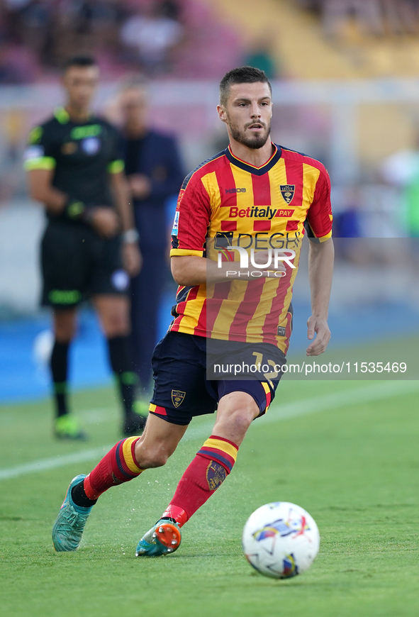 Frederic Gilbert of US Lecce is in action during the Serie A match between Lecce and Cagliari in Lecce, Italy, on August 31, 2024. 