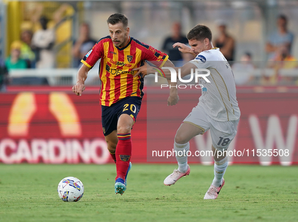 Ylber Ramadani of US Lecce is in action during the Serie A match between Lecce and Cagliari in Lecce, Italy, on August 31, 2024. 