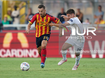 Ylber Ramadani of US Lecce is in action during the Serie A match between Lecce and Cagliari in Lecce, Italy, on August 31, 2024. (