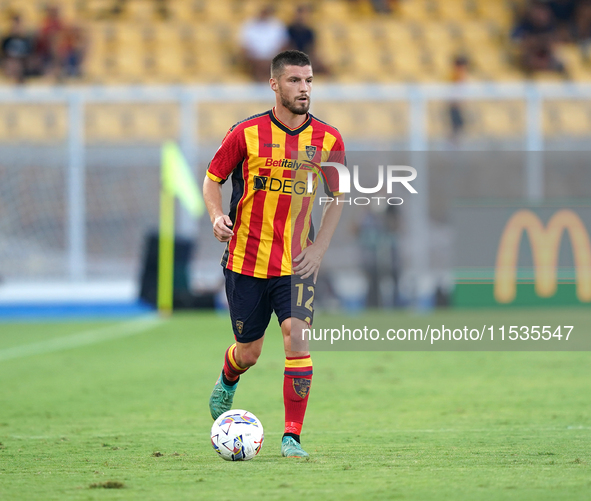 Frederic Gilbert of US Lecce is in action during the Serie A match between Lecce and Cagliari in Lecce, Italy, on August 31, 2024. 